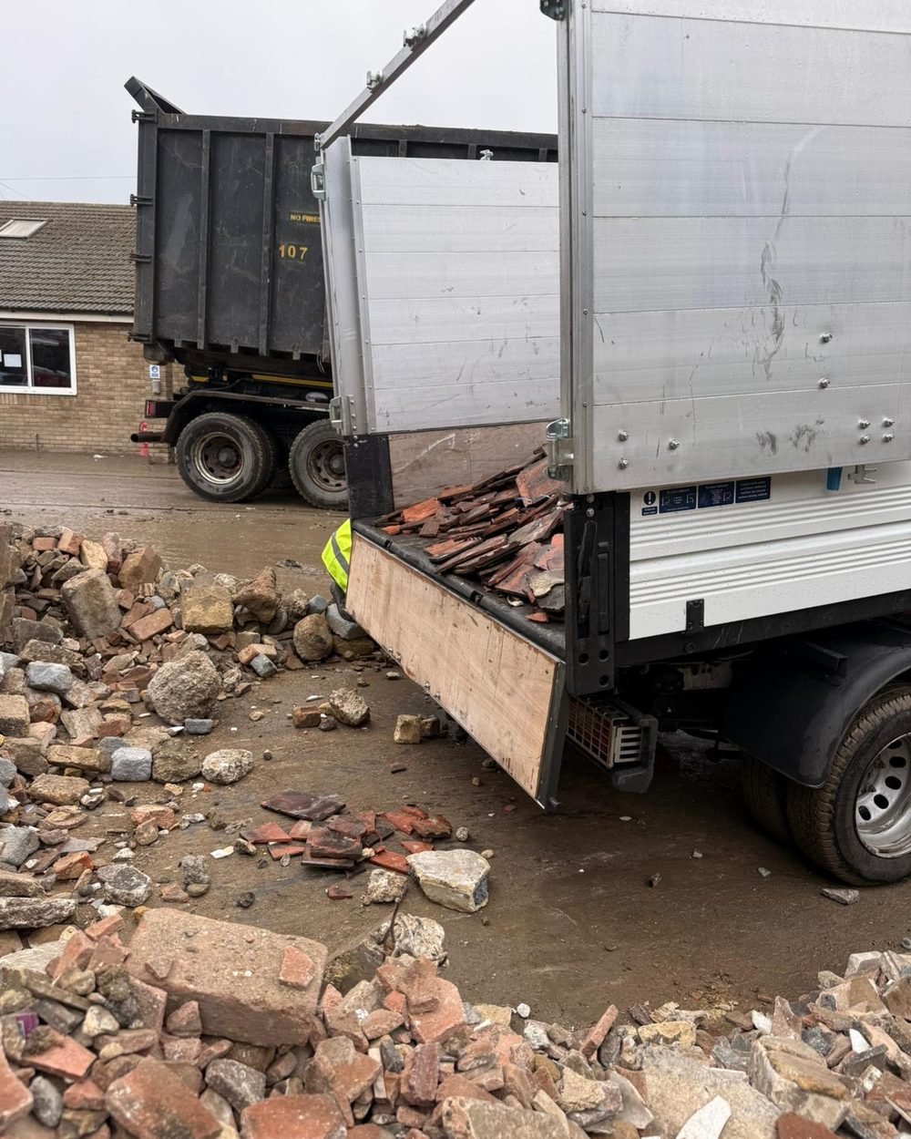 Southeast Waste Solutions tipper truck loaded with construction waste and roof tiles