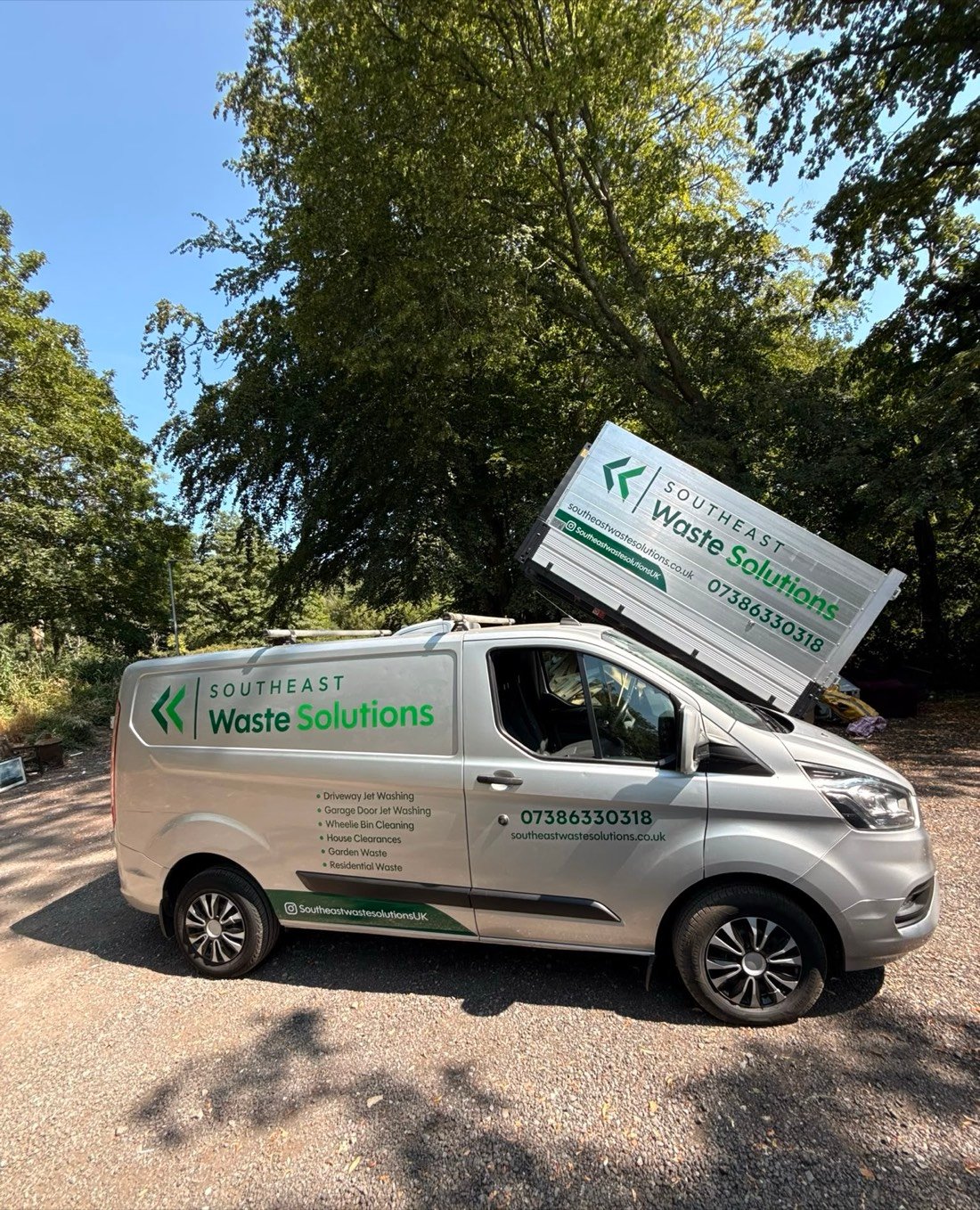 Southeast Waste Solutions branded van - side view with services listed